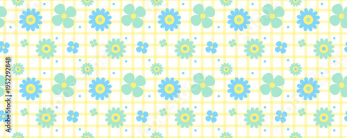 Cute floral gingham seamless pattern.  Blue and mint daisy flowers on yellow checkered plaid tablecloth background, symbolizing spring picnic, Easter, and botanical textile print design.