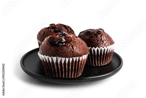 Chocolate cupcakes with cherry jam isolated on a white background. Chocolate muffin. High quality photo