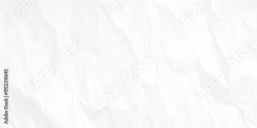 Crumpled white paper texture background with creases and folds ideal for use as a background or overlay