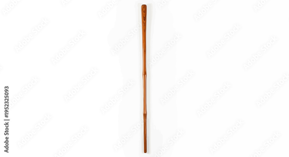 Obraz premium A long, slender wooden rod, possibly a wand, with a light brown color on a white backdrop