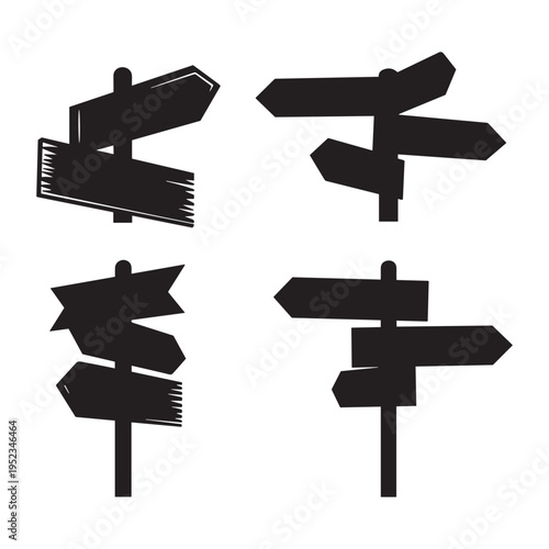 A set of four black and white directional signs on a white background