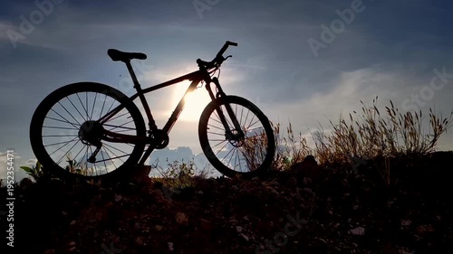 Bicycle Silhouette against the sunset, an outdoor bike ride on a sunny day 
