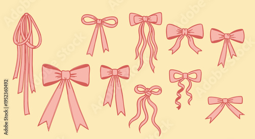 Collection of various pink bows and ribbons on a plain background