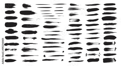Collection of diverse black brush strokes and paint splatters on white background