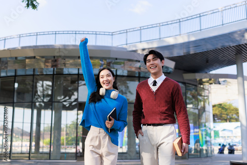 Diverse students celebrating academic success on university campus