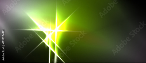 Bright starburst dominates image. Green hues blend into darkness. Light radiates outward, creating dynamic visual effect.
