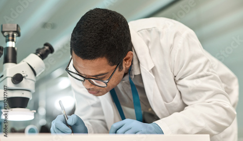 Fotografie Man, scientist and writing notes in lab for research, medical report and experiment results