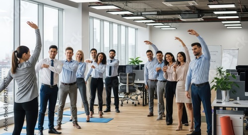 Diverse Team of Business Professionals Practicing Stretching Exercises in a Modern Office for Corporate Wellness