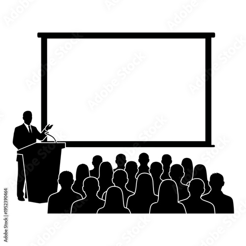 Man presenting to audience at podium.