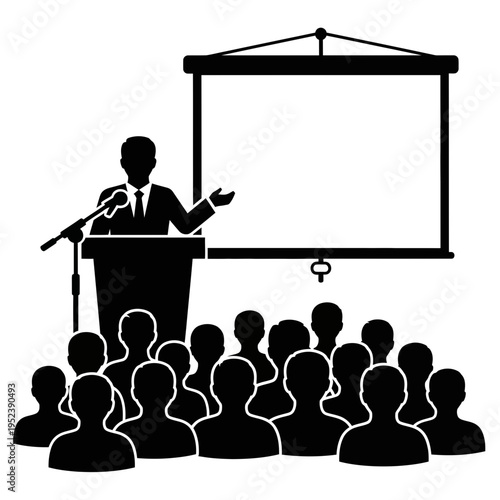 Businessman presenting to audience at conference.