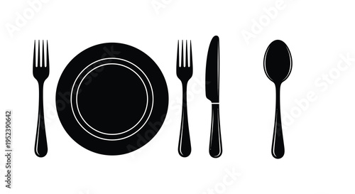 Black flatware and dinner plate arrangement simple dining setup silhouette