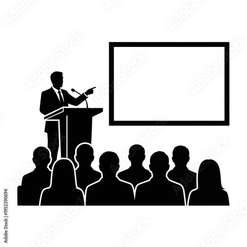 Man Speaking at Podium to Audience.