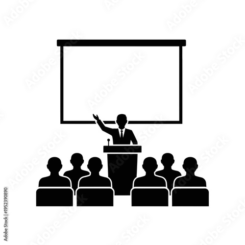 Businessman presenting to audience in meeting room.