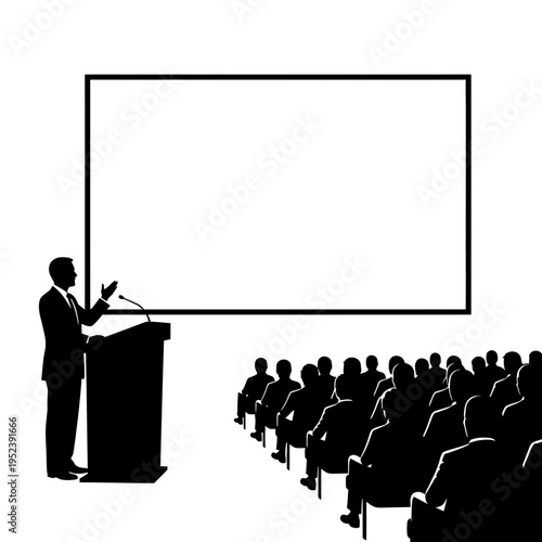 Man giving presentation to audience in hall.