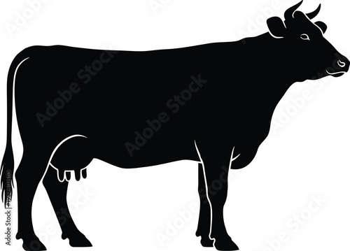 Silhouette of a cow standing in profile