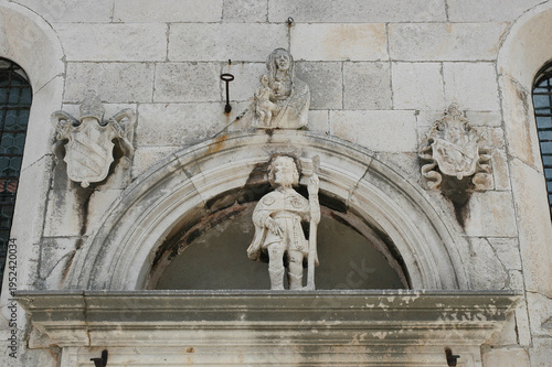 Photography The renaissance portal of the Church of Saint Roch in Korcula features a statue