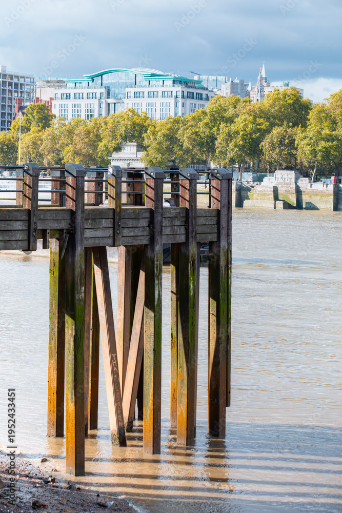 Fototapeta premium Wooden pier on the Southbank of River Thames, City of London, UK