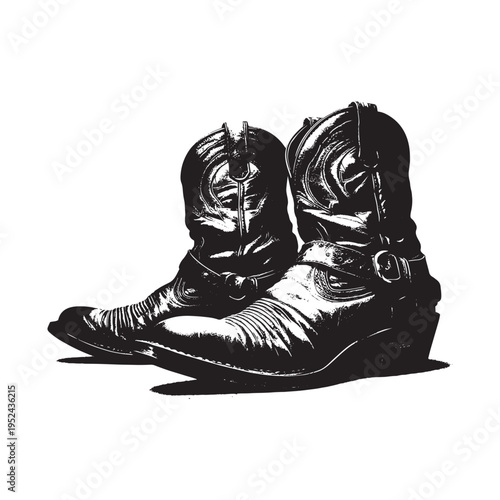 A black and white image of cowboy boots