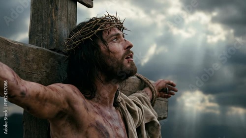 Man on cross in passion week scene with crown of thorns, jesus christ suffering crucifixion against dramatic sky