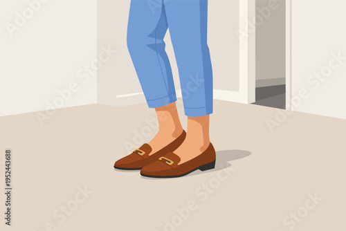 Person standing, wearing stylish brown loafers with golden buckles, combining comfort and elegance for everyday fashion