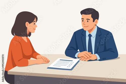 Woman and man at a desk, engaging in a job interview or business meeting, discussing career prospects