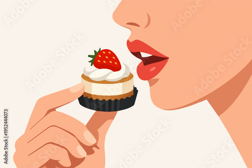 Woman's hand holding a delicious mini strawberry cheesecake, about to eat the sweet dessert, showing enjoyment