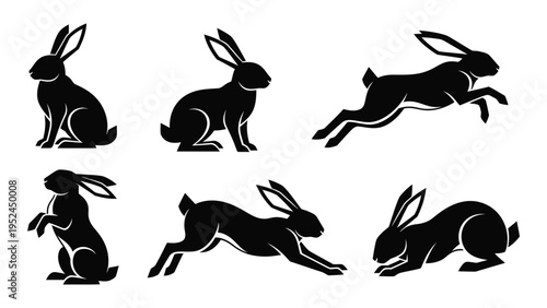 Black silhouettes of rabbits in various poses sitting running and alert