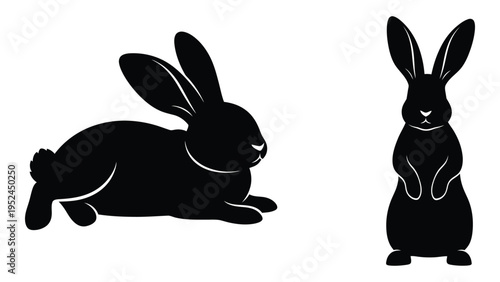 Two black silhouettes of rabbits are displayed one reclining and one upright