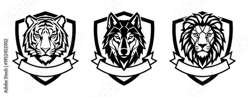 Animal head emblem set in black inside shield designs with ribbon banners