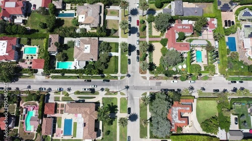Aerial view of luxury Beverly Hills residential neighborhood with palm trees and pools