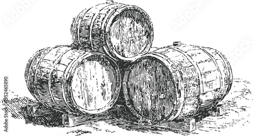 Vintage wooden barrels stacked on pallets, rustic storage containers for liquids and aging