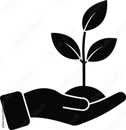 Hand holding growing plant symbol of environmental care