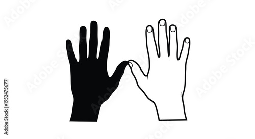 Two hands one dark and one light nearly touching each other