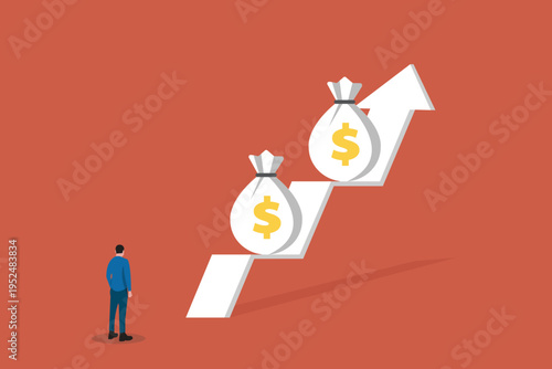 Businessman looking up at a rising growth arrow with dollar symbols, representing financial success, profit forecasting, and wealth accumulation