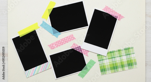 Flat lay composition of blank polaroid photo frames decorated with colorful washi tapes on a light beige background.