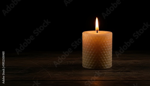 candle, flame, light, memorial, darkness, mourning, beeswax candle with honeycomb pattern glowing on a rustic wooden table, symbol of hope and serenity in the dark night.