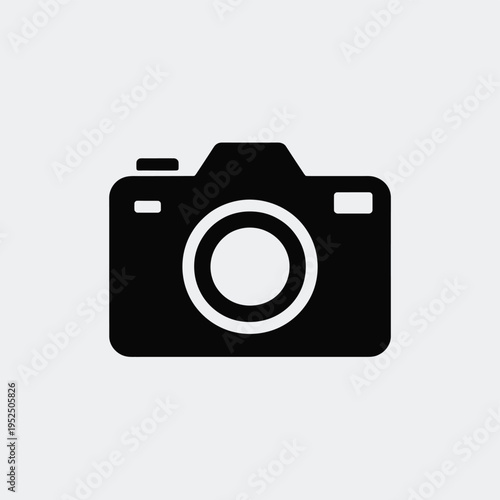 Simple black silhouette of a classic single lens reflex camera icon