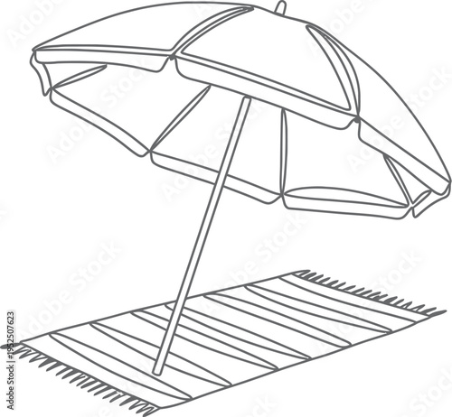 Beach umbrella on a striped towel