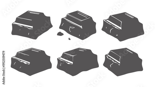Fotografia Six dark gray chocolate pieces with white highlights white