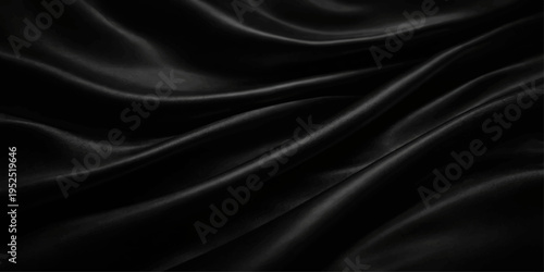 Elegant black satin fabric background with smooth silky waves and a shiny luxury textile texture for an aesthetic fashion backdrop