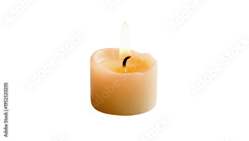Isolated lit small wax candle with a warm glowing flame and melted wax on top
