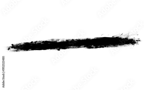 Abstract black grunge brush stroke isolated on a clean white background, creating a textured paint smear for artistic design elements and graphic overlays.