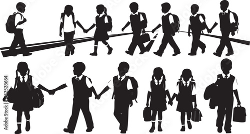 Silhouettes of school children walking together in a line