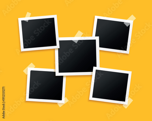 five photo frames sticked by tape background