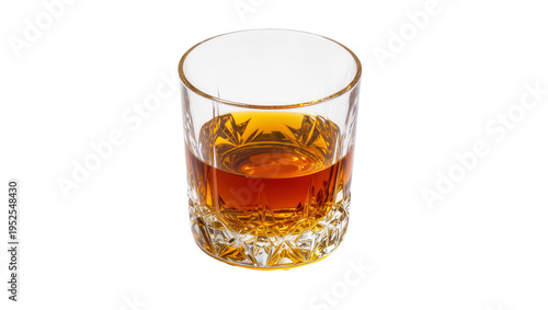 Fotografija Isolated stylish glass filled with rich golden amber whiskey or bourbon alcoholi