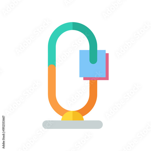 A colorful magnet with a paperclip on a white background
