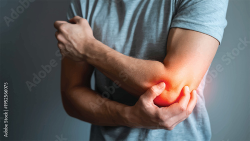 Elbow Pain Awareness: A person clasps his elbow, highlighting discomfort, redness, and distress in an isolated view.