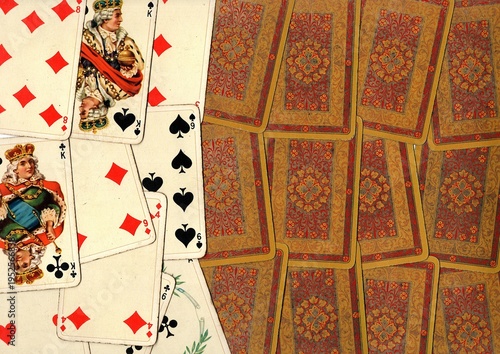 Photography A montage of vintage playing cards on a white background.