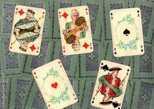 Photography A montage of vintage playing cards on a white background.