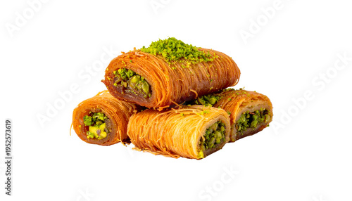 Stack of baked pastries with a golden crust and a green, nutty filling